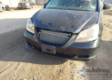 2010 Honda Odyssey Ex-L z USA, uszkodzony, nr VIN 5FNRL3H64AB106589